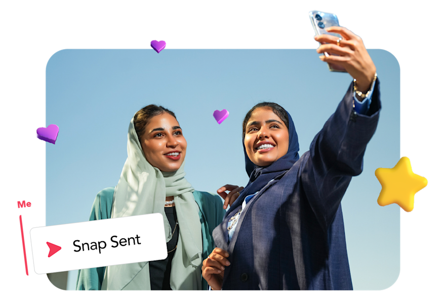 Two women taking a selfie.